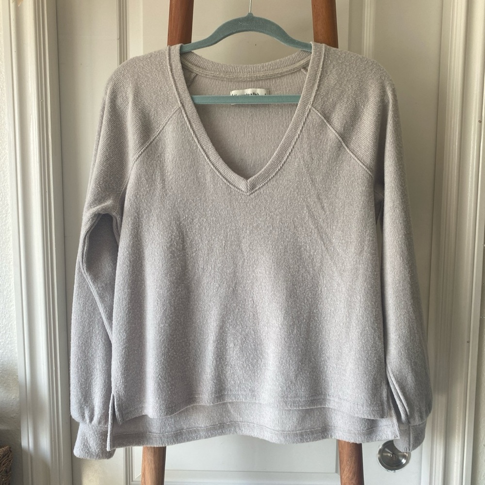 Light grey v-neck sweater
